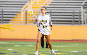 Green Tallies Nine Goals as Women's Lacrosse Defeats Eastern Connecticut 22-5